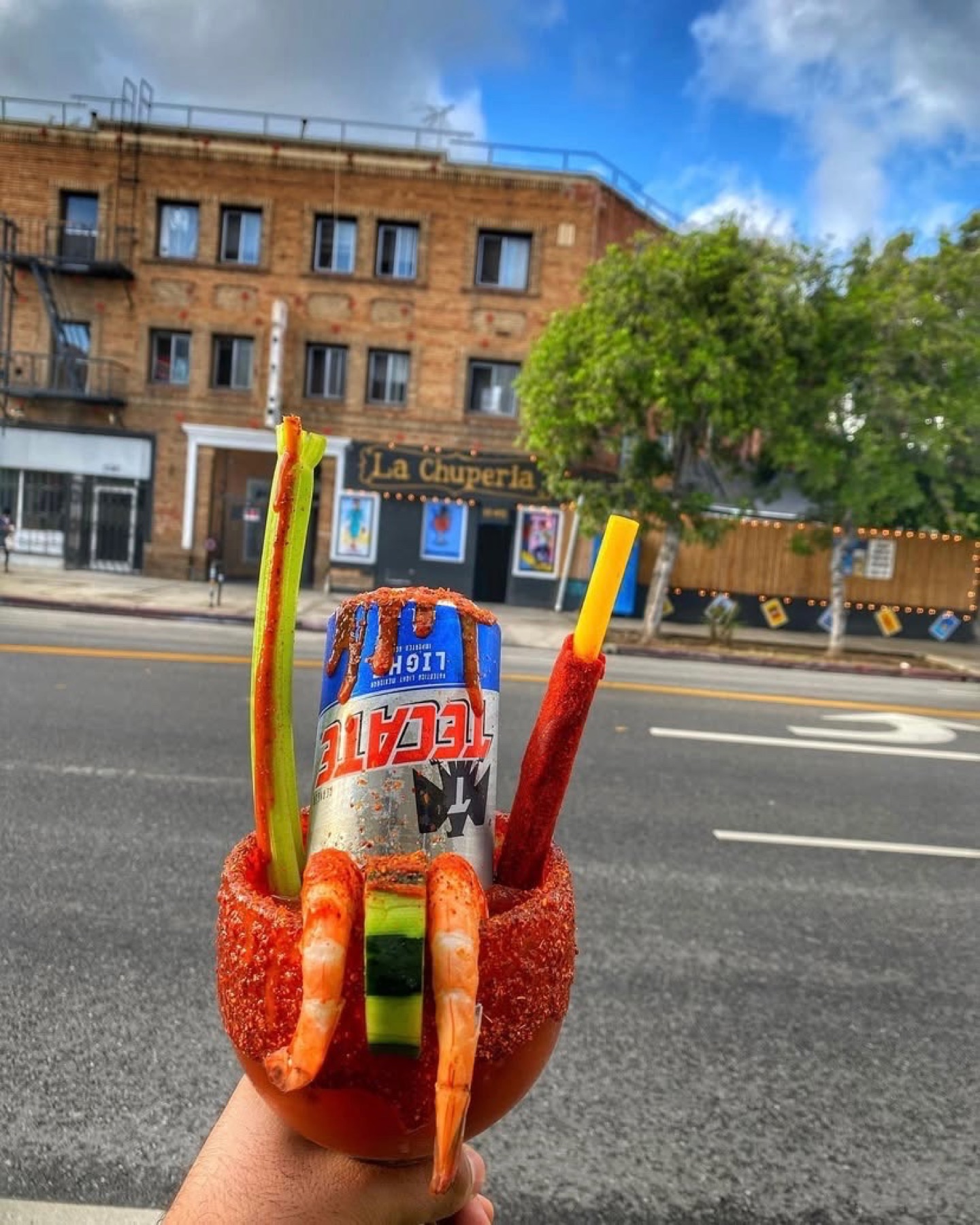 A La Chuperia michelada in front of the 1145 N Mission Rd storefront